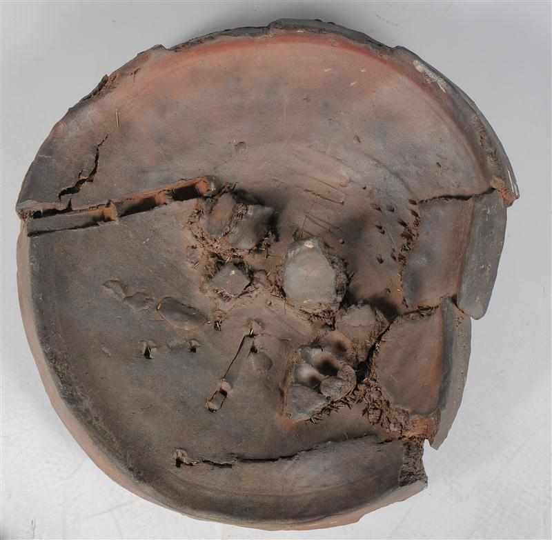 Appraisal: PETER VOULKOS - UNTITLED PLATE Wood-fired ceramic signed and dated