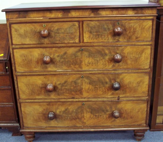 Appraisal: A Victorian mahogany chest of two short and three long