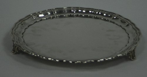 Appraisal: A silver salver Gladwyn Ltd Sheffield with pie crust border