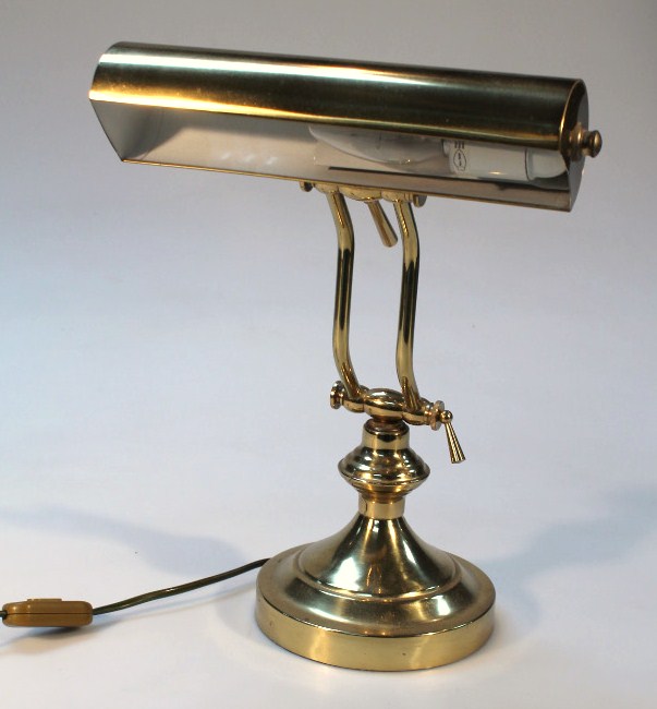 Appraisal: A thC Art Deco design brass table lamp with shaped