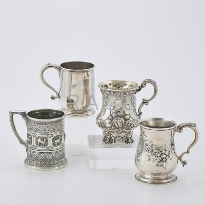 Appraisal: FOUR ENGLISH SILVER MUGS Ornately decorated handled mug with fruit