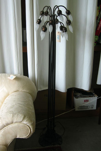 Appraisal: A PAIR OF TIFFANY STYLE TWELVE-LIGHT LILY FLOOR LAMPS of