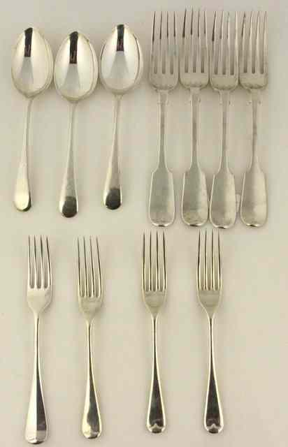 Appraisal: Four silver table forks London fiddle pattern and four silver