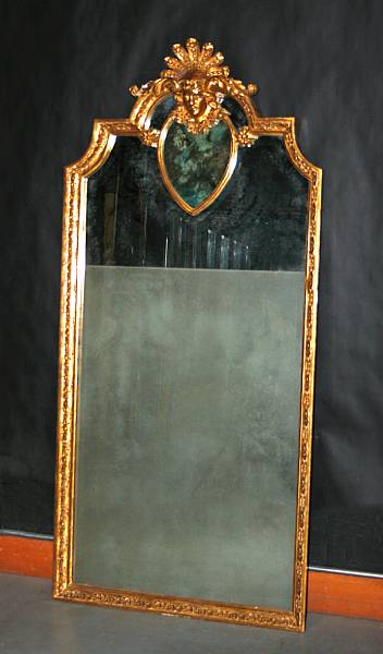 Appraisal: A Baroque style giltwood mirror height ft in width in