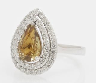 Appraisal: Lady's Platinum Dinner Ring with a pear-shaped carat yellow sapphire