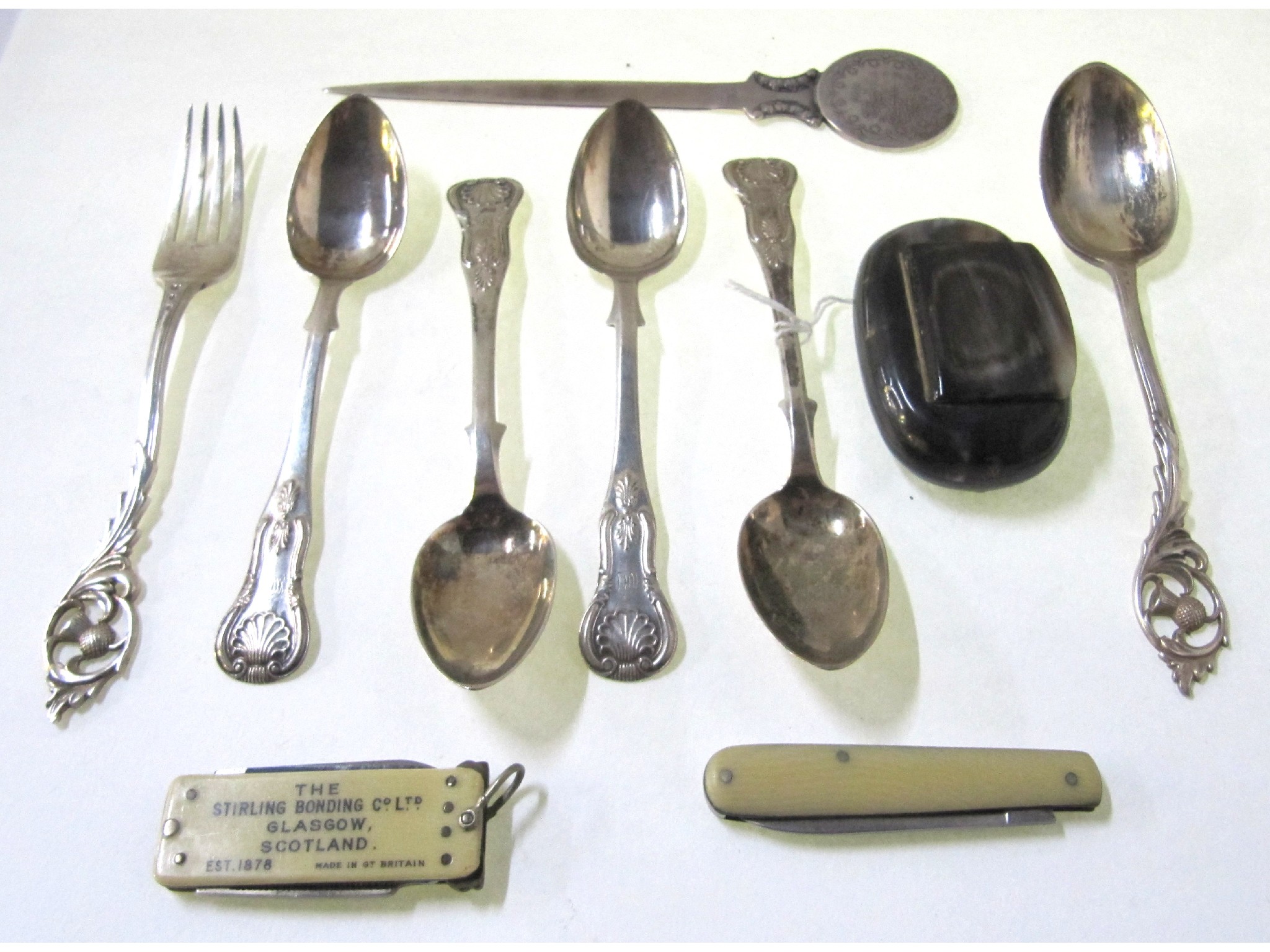 Appraisal: A lot comprising four silver teaspoons Edinburgh marks a spoon