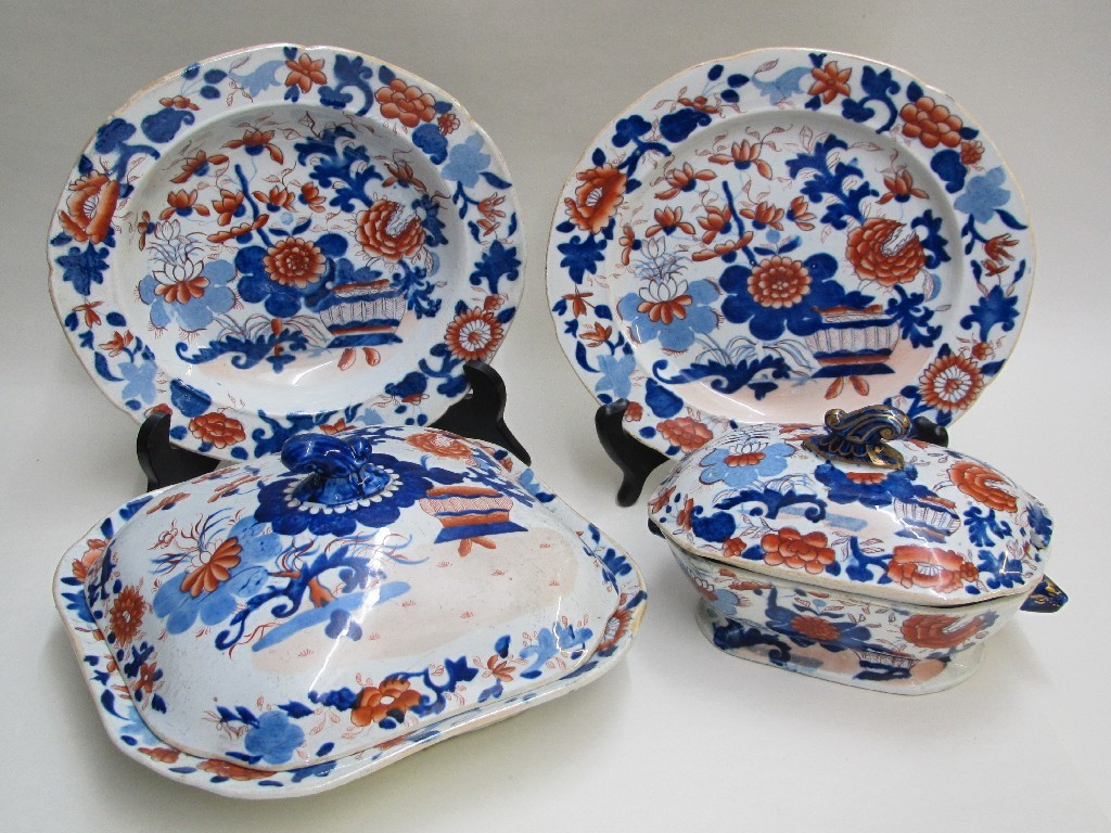 Appraisal: A Masons Ironstone Imari pattern dinner service comprising four sauce