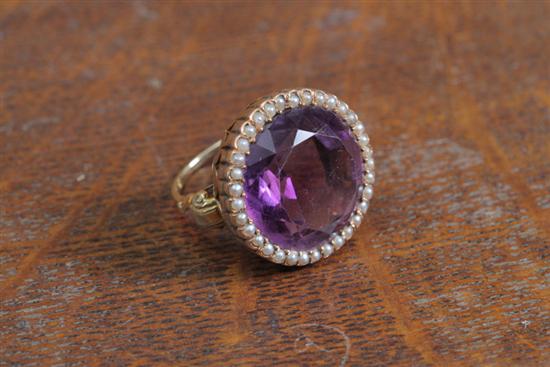 Appraisal: K LADIES RING Cut amethyst center stone surrounded by pearls