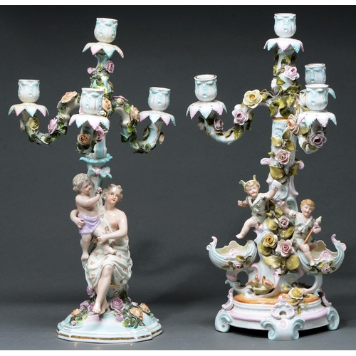 Appraisal: Two Sitzendorf floral encrusted candelabra and matching four light branches