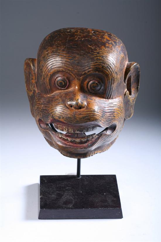 Appraisal: POLYCHROME WOOD HEAD OF MONKEY Dayak Indonesia o - in