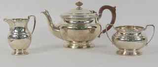 Appraisal: A silver tea service Adie Bros Ltd Birmingham with embossed