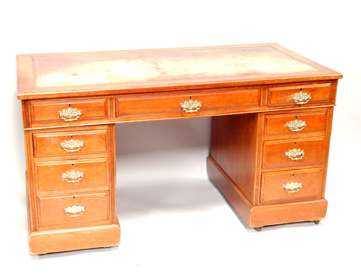 Appraisal: A late Victorian walnut twin pedestal desk having leather inset