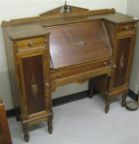 Appraisal: WALNUT SLANT-FRONT SECRETARY American c s The slant front writing