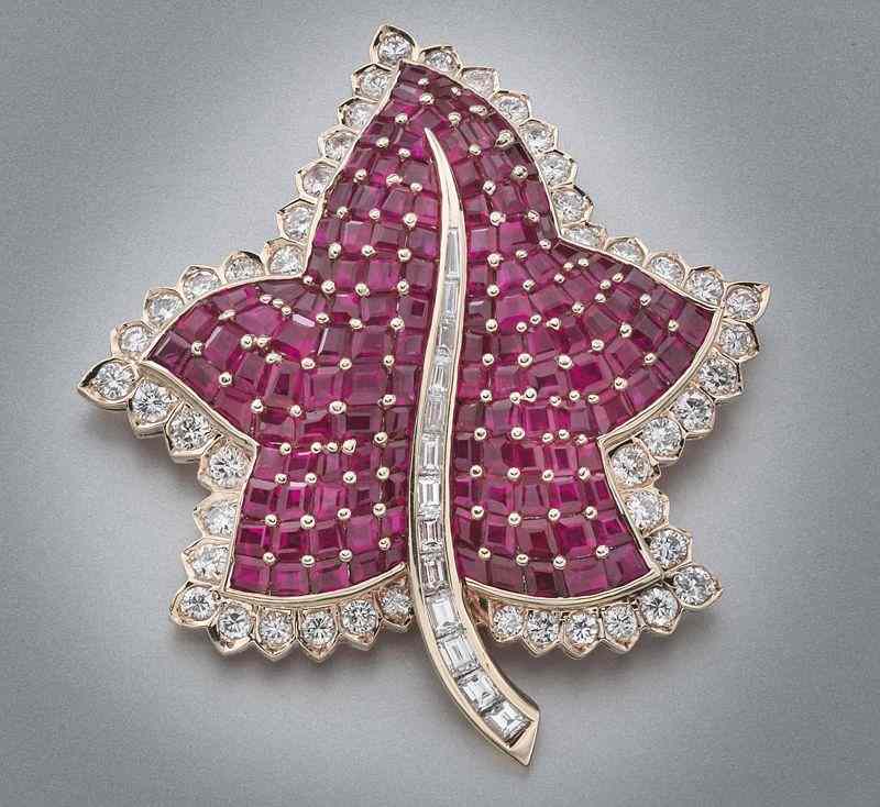 Appraisal: Oscar Heyman diamond and ruby maple leaf broochfitted with square