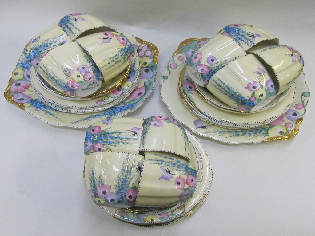 Appraisal: May Wilson handpainted teaset decorated with flowers and butterflies to