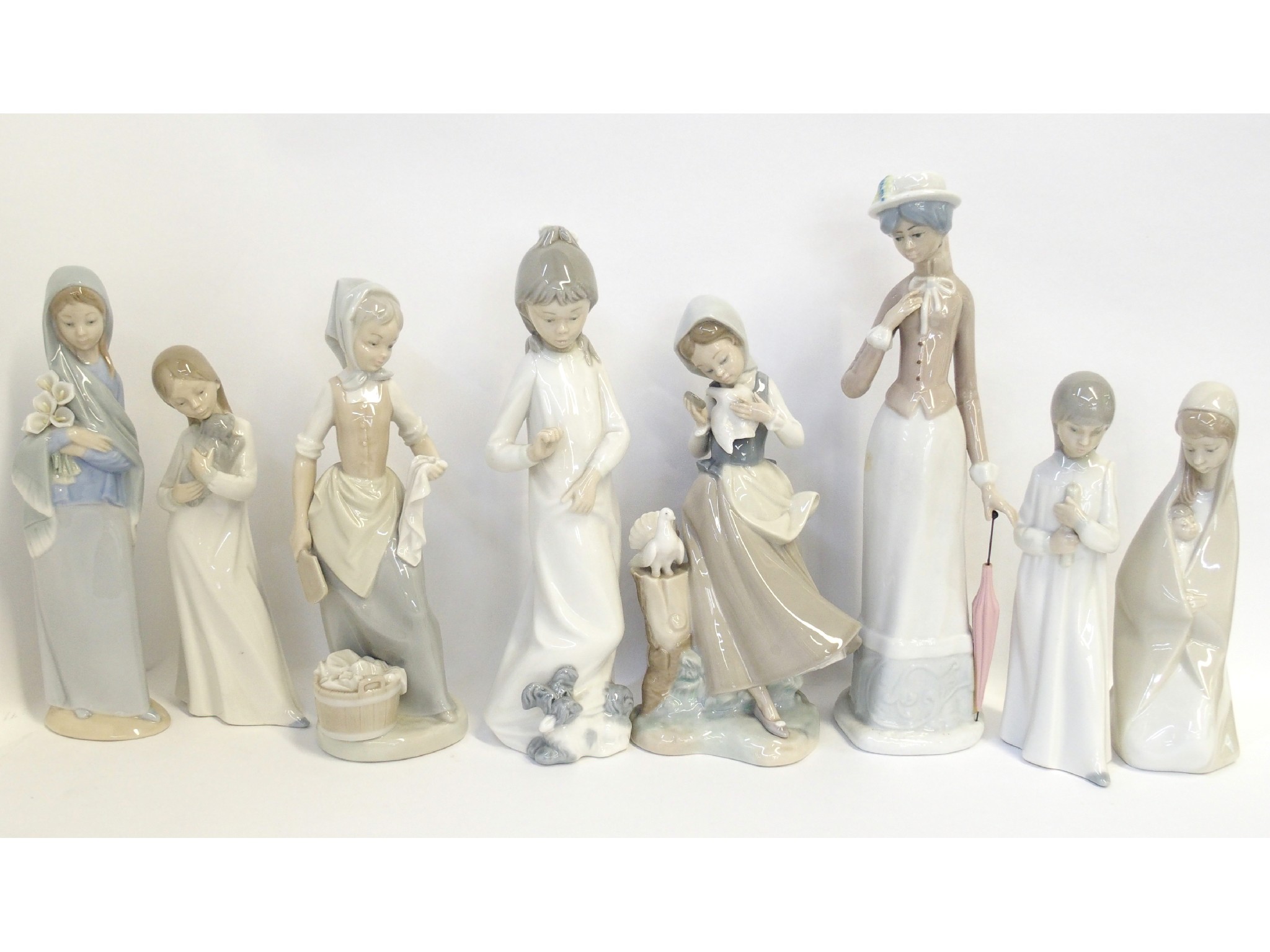 Appraisal: Three Lladro figures of children two Nao examples and three