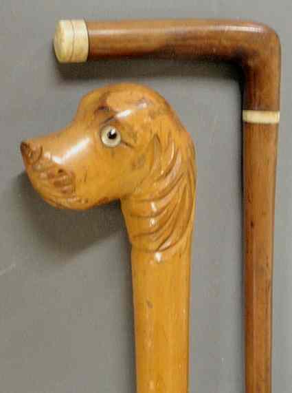 Appraisal: Cane with carved maple dog head with glass eyes l