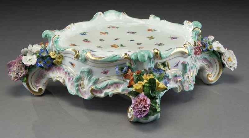 Appraisal: Meissen porcelain plateauwith gilt details raised on rocaille feet with