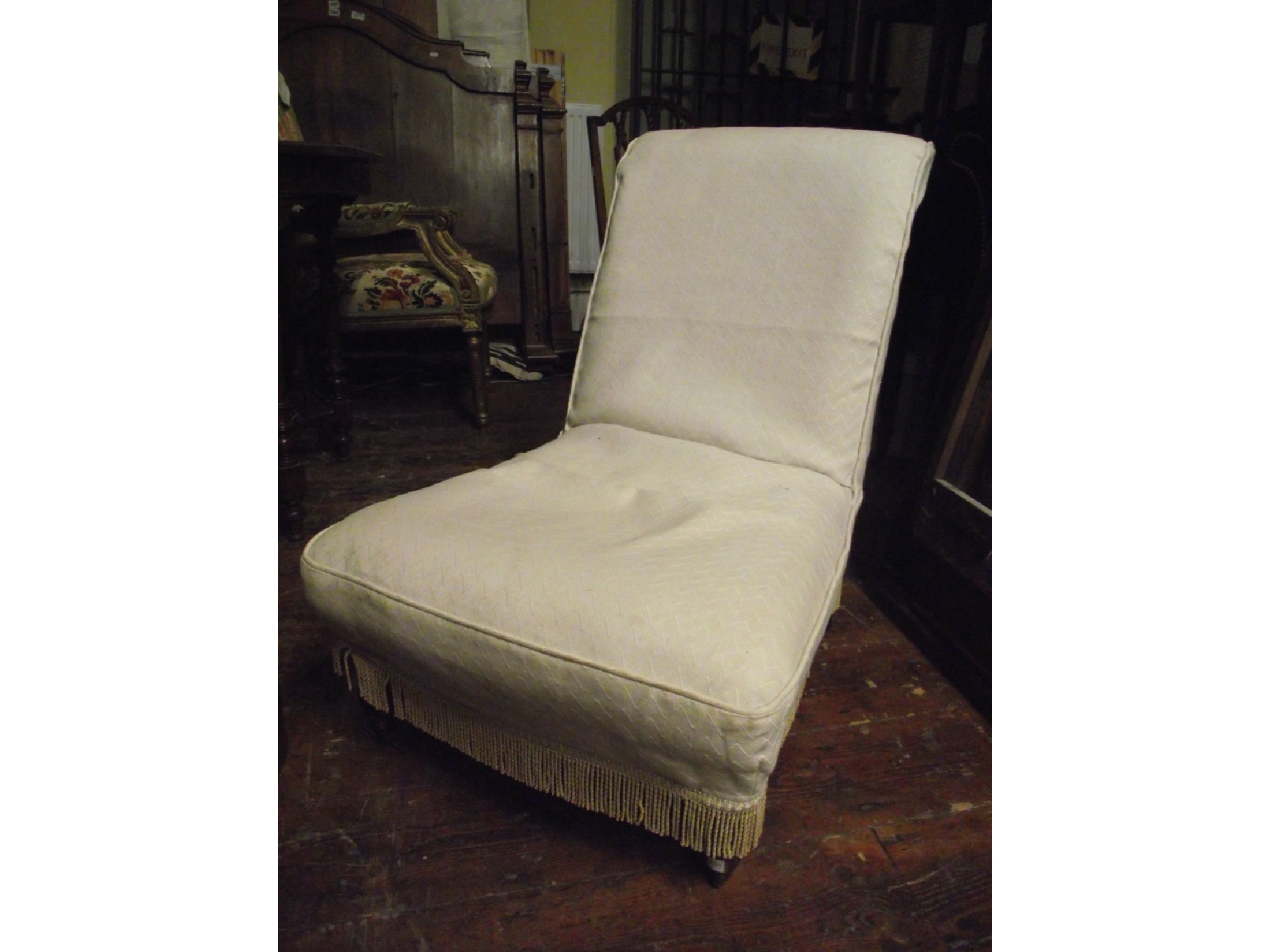 Appraisal: A Victorian nursing or drawing room chair with upholstered framework