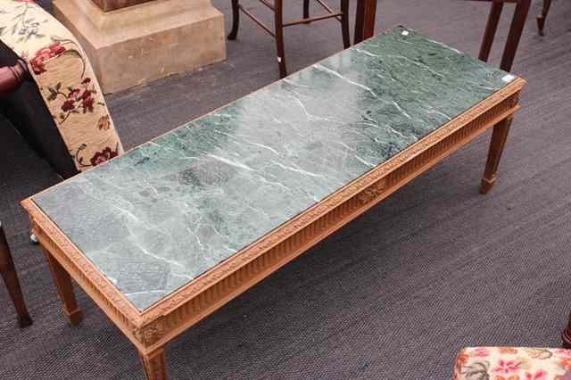 Appraisal: A PINE LOW RECTANGULAR OCCASIONAL TABLE with green marble inset