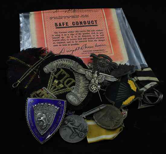 Appraisal: A group of assorted medals and badges including Nazi and