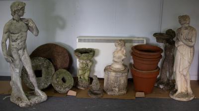 Appraisal: Two reconstituted stone garden figures cm and cm high and