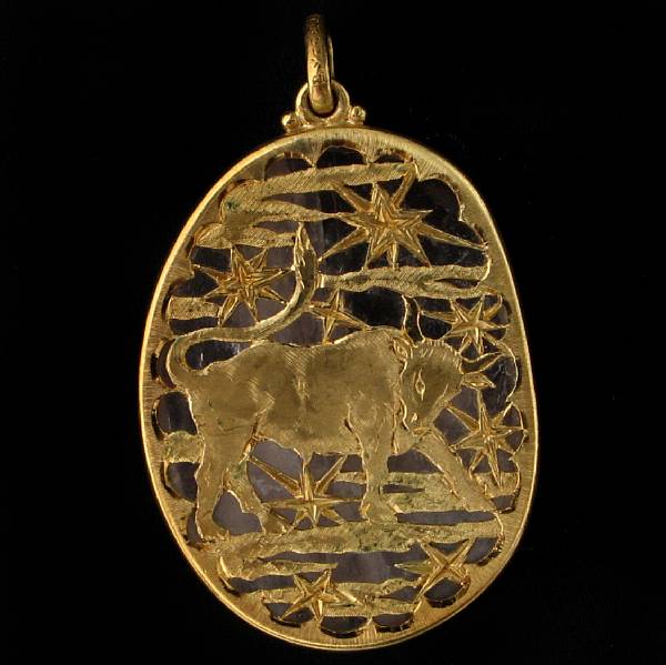 Appraisal: An k gold and rose quartz Taurus pendant signed Buccelati