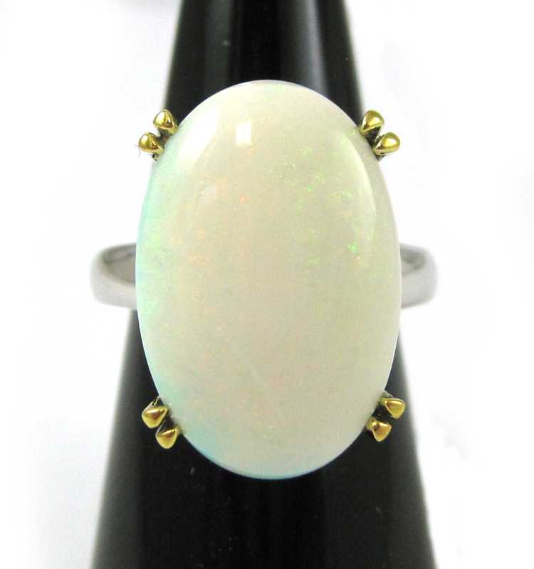 Appraisal: OPAL AND FOURTEEN KARAT GOLD RING The white gold ring