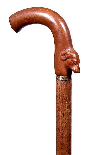 Appraisal: Gutta Percha Dog Cane- Ca - A firm handle with