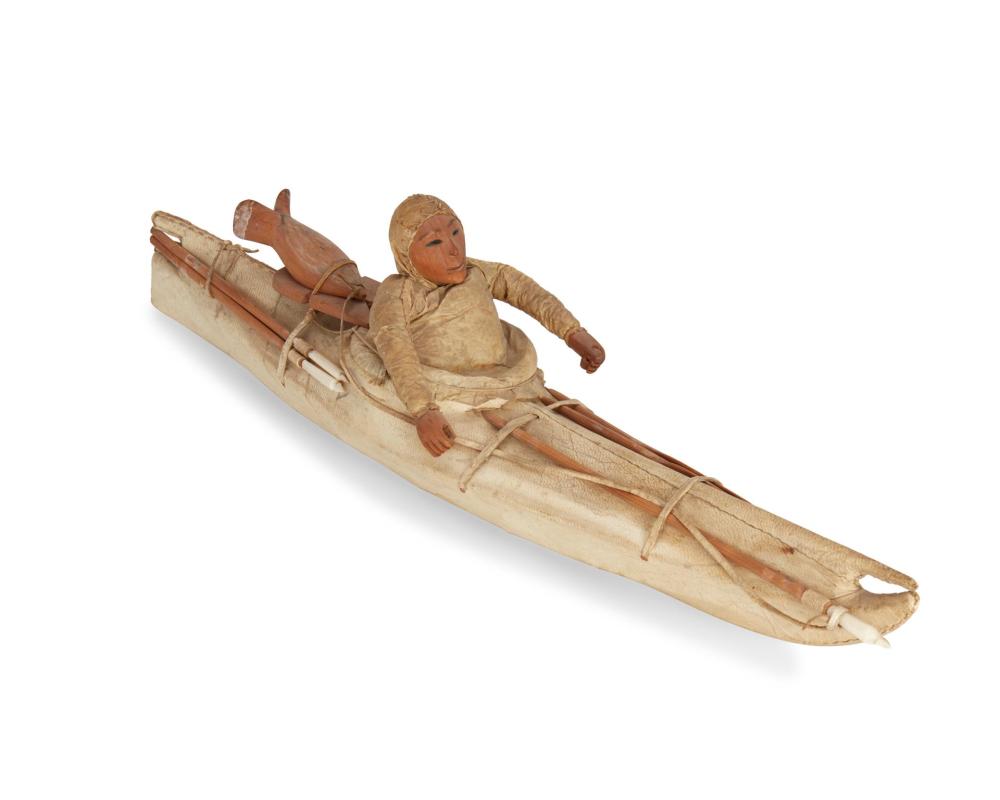 Appraisal: An Eskimo Inuit model kayak with figure Late th Early