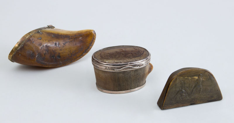 Appraisal: TWO CONTINENTAL RELIEF-CARVED HORN BOXES AND A BRASS-MOUNTED WALRUS TOOTH