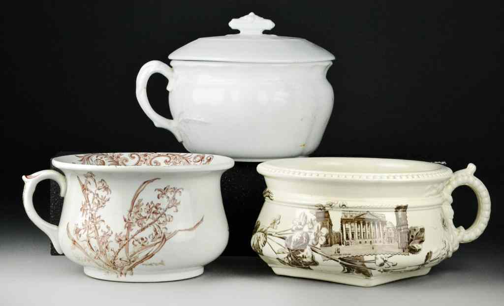 Appraisal: Chamber PotsTo include two brown transferware pots one marked Doulton