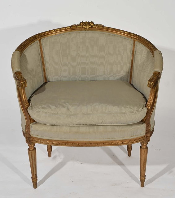 Appraisal: A FRENCH GILTWOOD FAUTEIL with carved frame shot silk upholstery