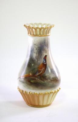 Appraisal: A Royal Worcester vase decorated a pheasant by James Stinton