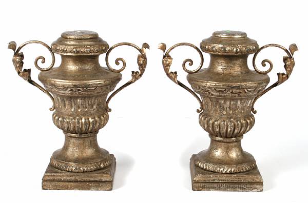 Appraisal: A pair of Italian style silvered wood and tole urns