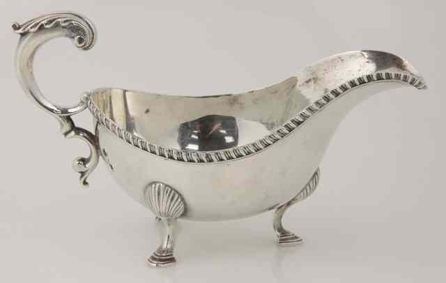 Appraisal: A silver sauce boat Barnard London with gadrooned rim and