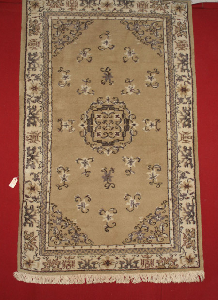 Appraisal: Chinese Beige Ground Rug Modern Approximately ft in x ft