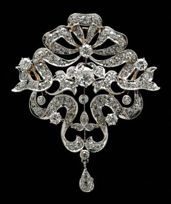 Appraisal: Vintage ct diamond brooch pendant with central old European-cut diamond