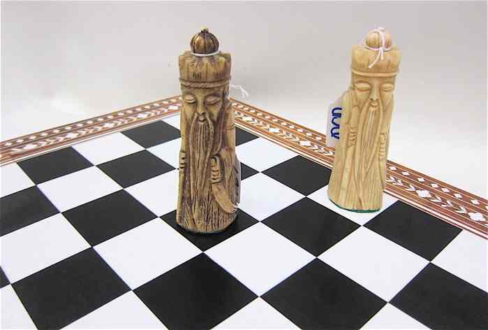 Appraisal: HAND CARVED BONE CHESS SET WITH BOARD in natural white