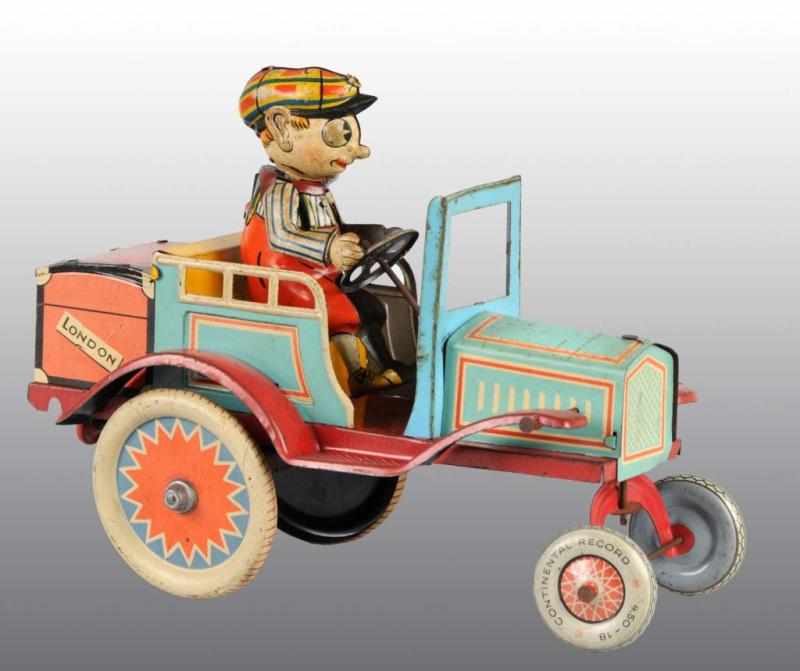 Appraisal: Tin Whoopee Car Wind-Up Toy Description German Pre-war Working Nice