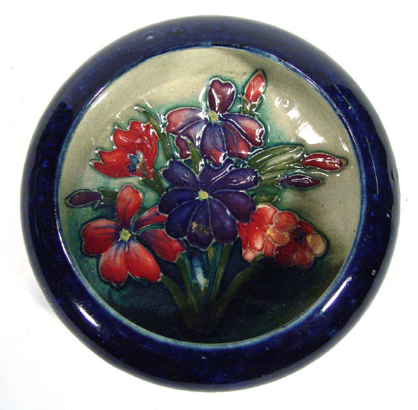 Appraisal: Moorcroft pottery dish hand painted and tubelined with spring flowers