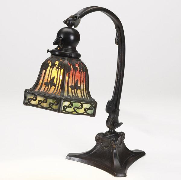 Appraisal: HANDELCopper bronze and polychrome slag glass desk lamp in tropical