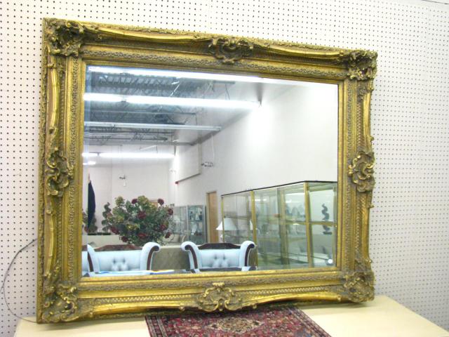 Appraisal: Large Traditional style decorator wall mirror with molded wood French