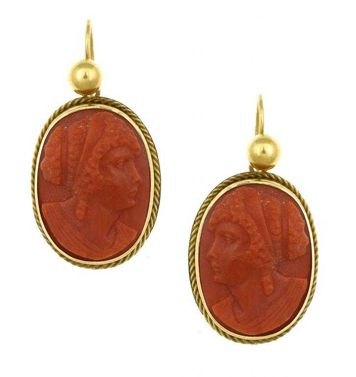 Appraisal: A PAIR OF ANTIQUE CORAL CAMEO EARRINGS with the head