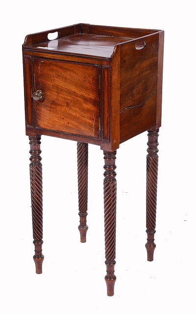 Appraisal: A GEORGE IV MAHOGANY NIGHT CUPBOARD with tray top panelled