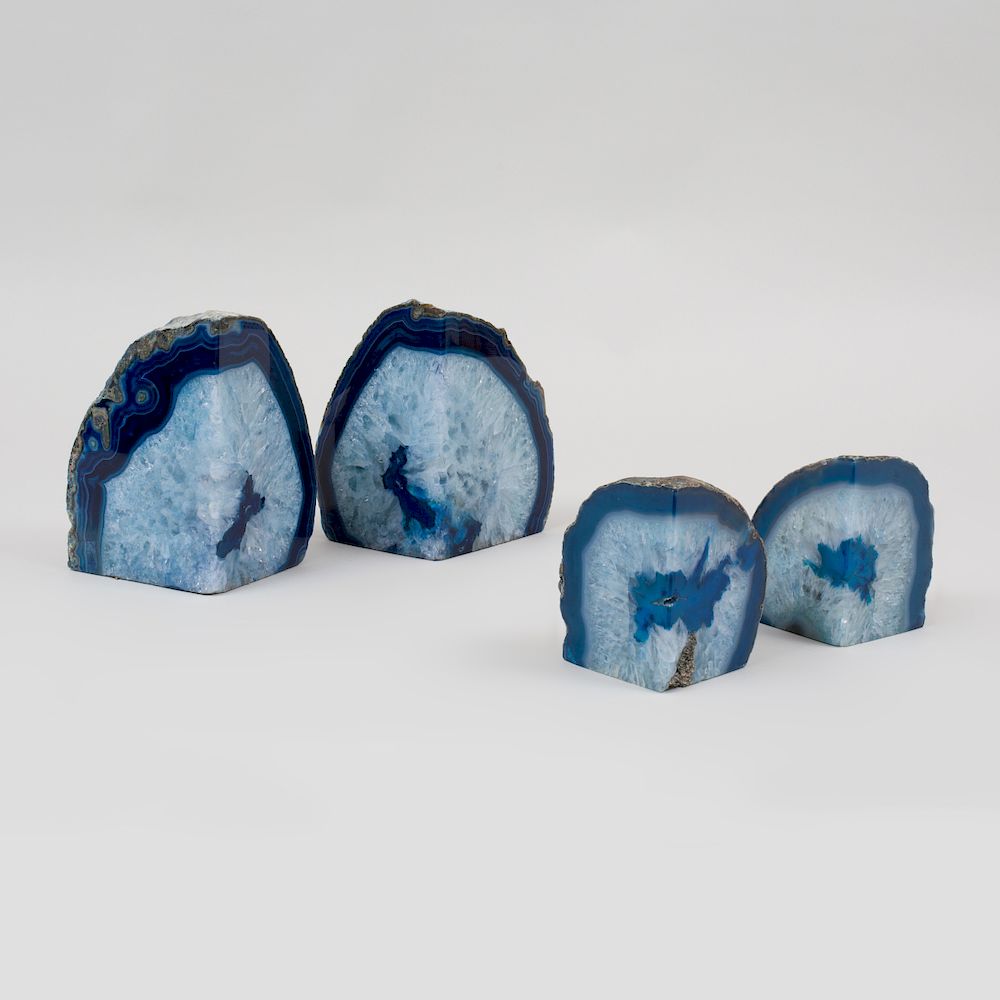 Appraisal: Two Pairs of Blue Agate Geode Book Ends The larger