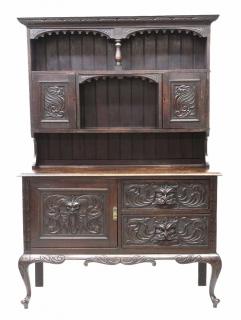 Appraisal: VICTORIAN CARVED GREENMAN CUPBOARD Victorian carved cupboard in two parts