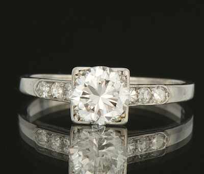 Appraisal: A Ladies' Platinum and Diamond Ring Platinum ring featuring a