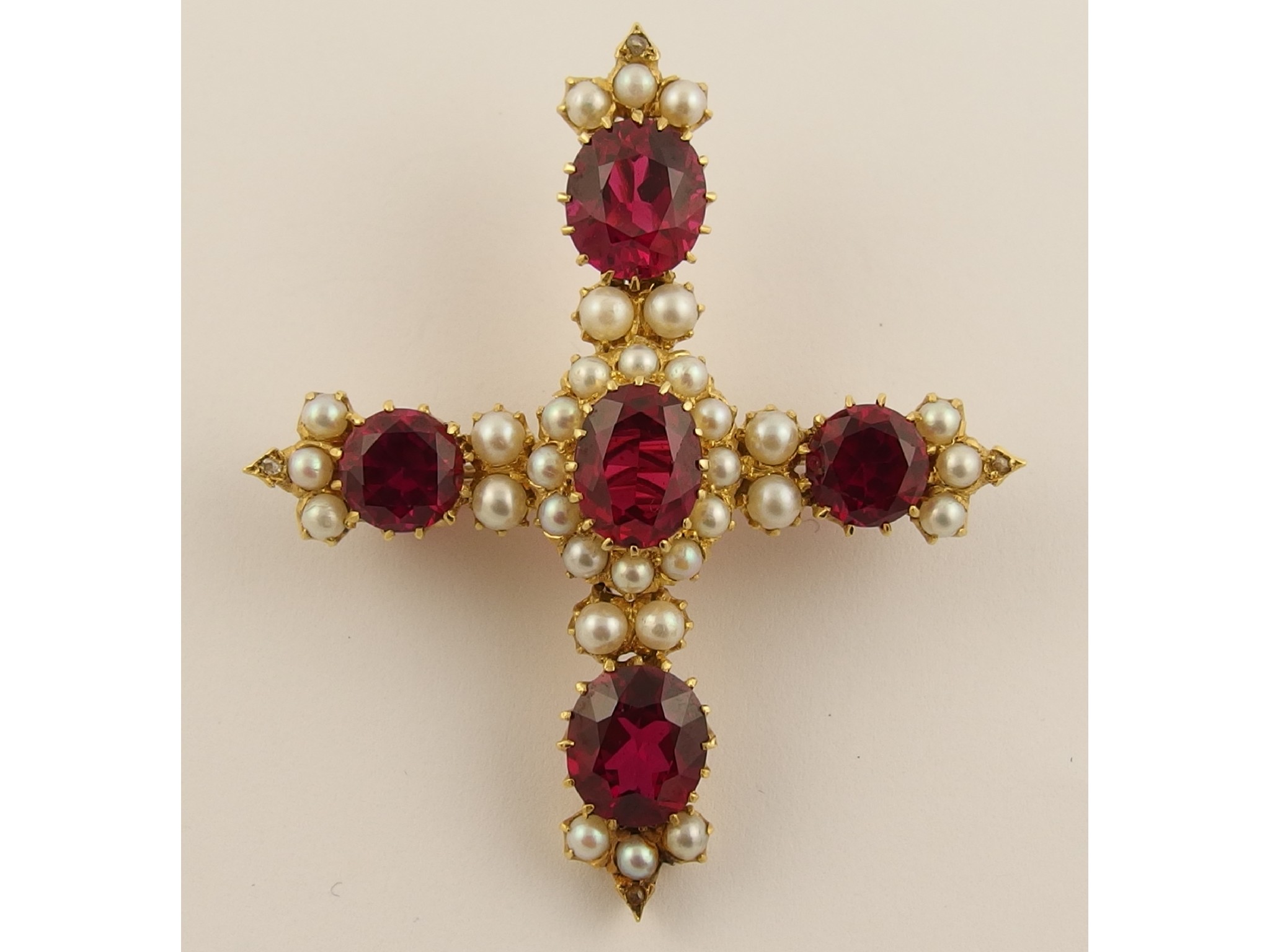 Appraisal: A synthetic ruby diamond and seed pearl pendant broochmade in