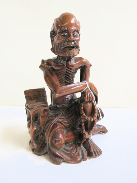 Appraisal: CHINESE QING DYNASTY CARVED WOOD SEATED FIGURE in a narrative